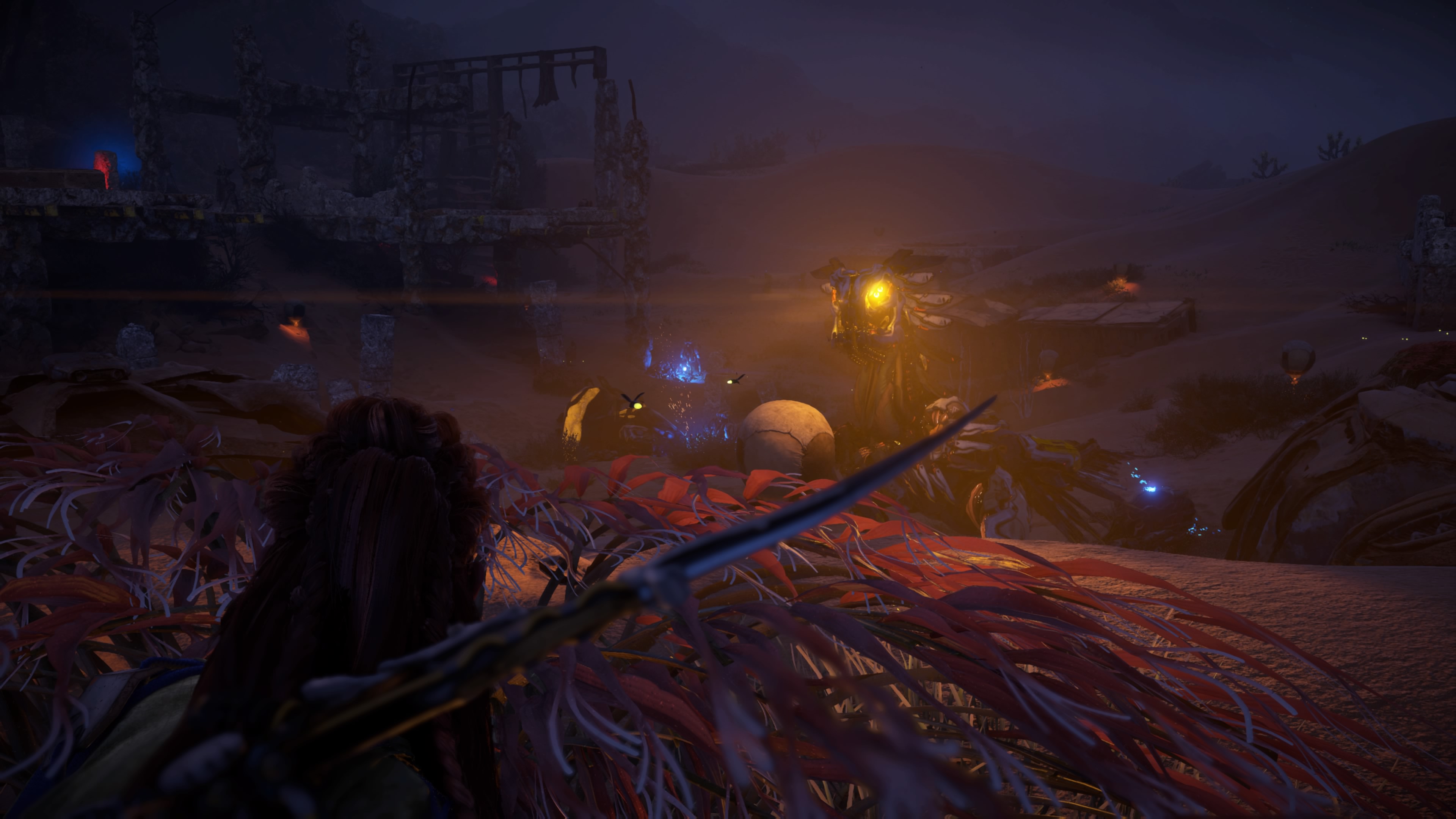 Hiding spots are conveniently marked with the same red hue as Aloy’s hair