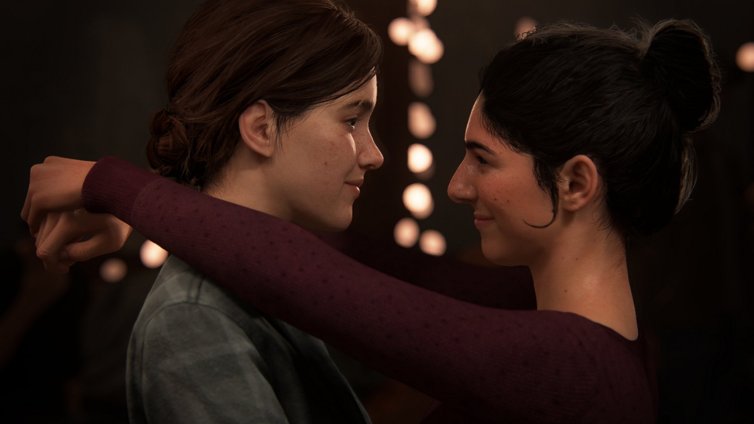 Ellie and Dina share a dance at the party