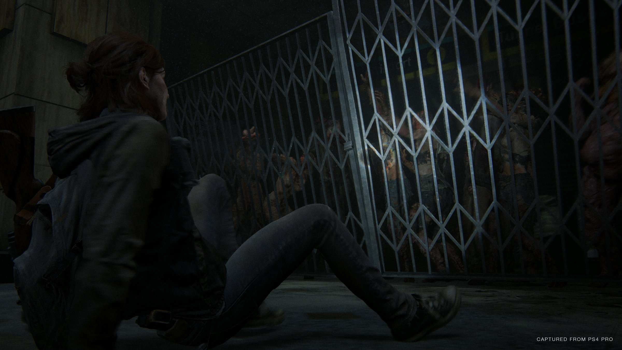 Hordes of infected clamour at the gates for a bite of Ellie